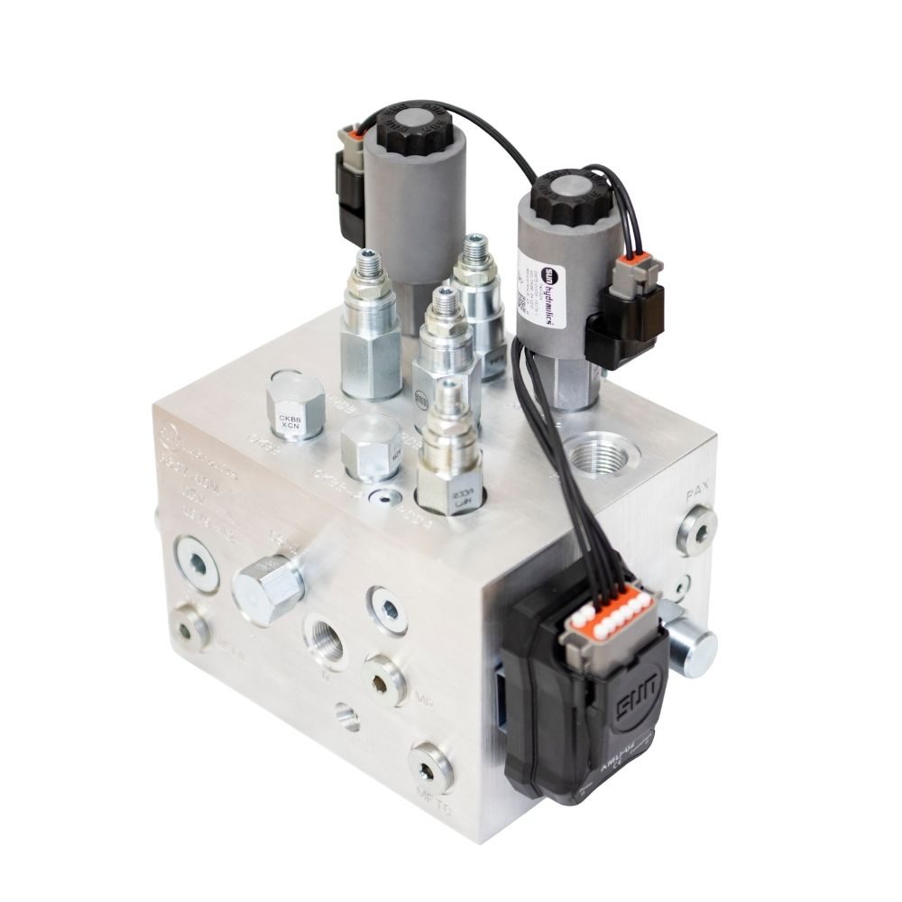 Sun Hydraulics screw-in cartridge valves arranged on a bench