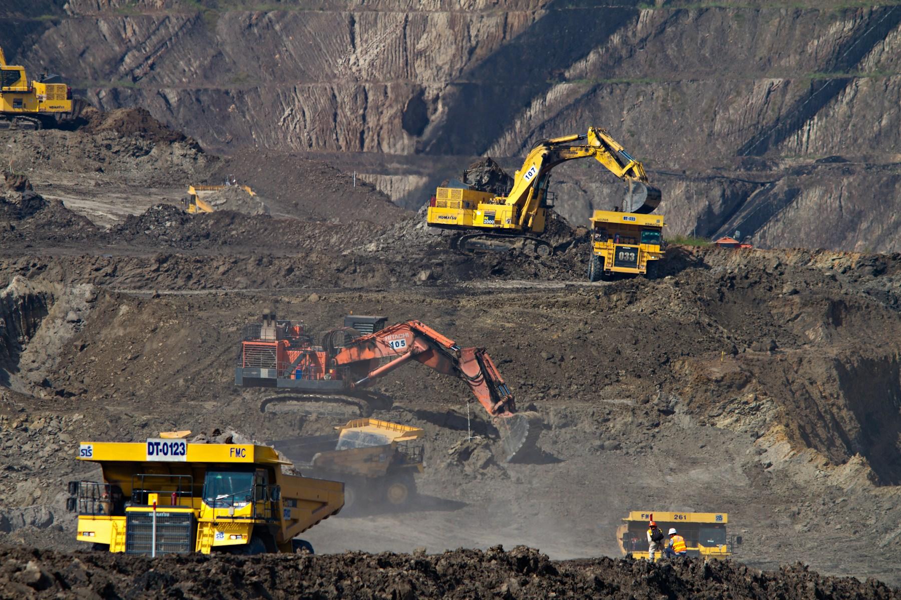 Mining excavator working an open pit face